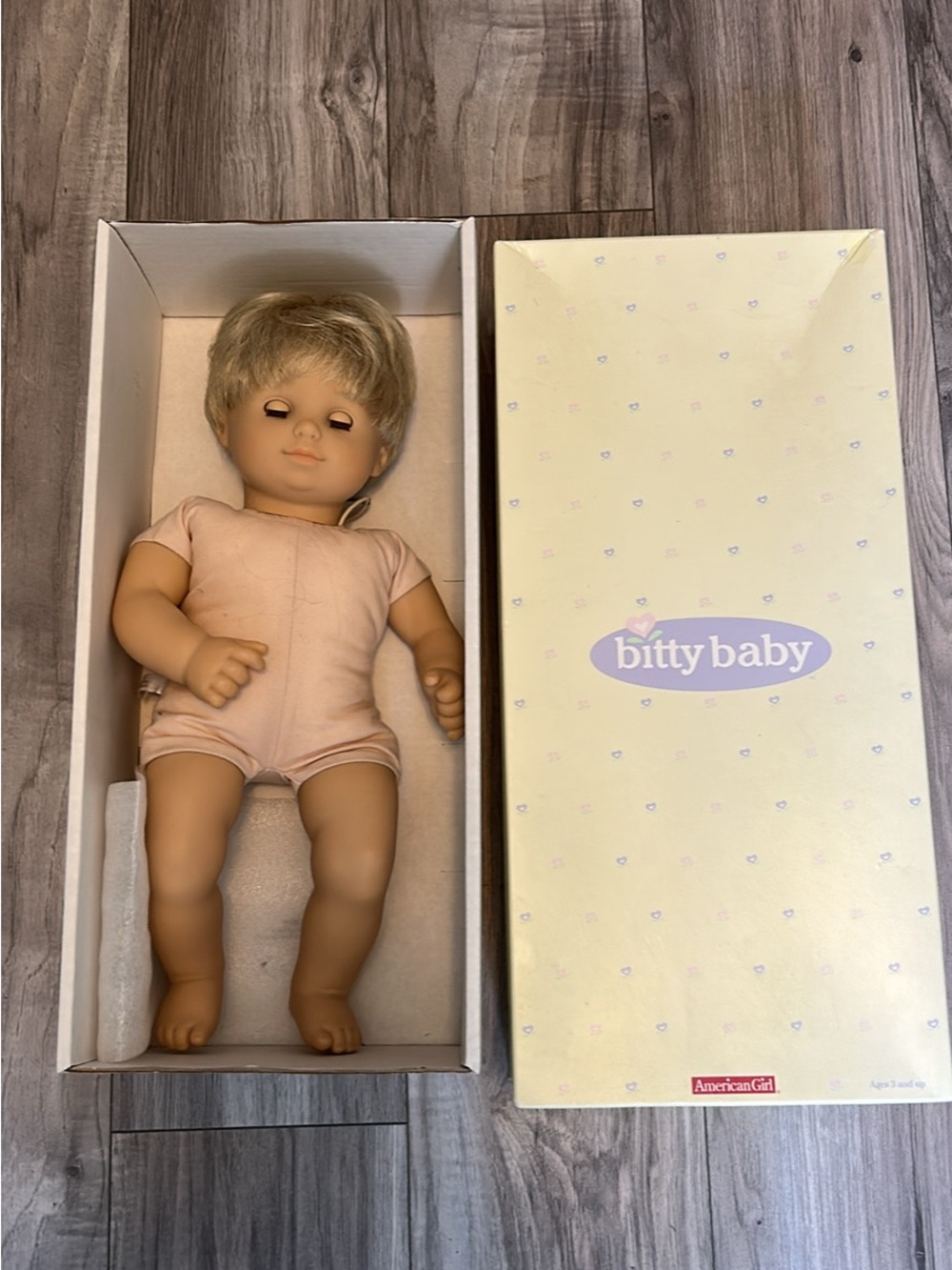 American Girl Bitty Baby Blonde Doll in Light Pink Outfit